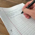 Hand writing on college ruled paper a question about whether hypergraphia is healthy.