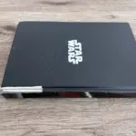 damaged hardback journal lying on the floor